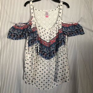 Off the shoulder floral blouse.